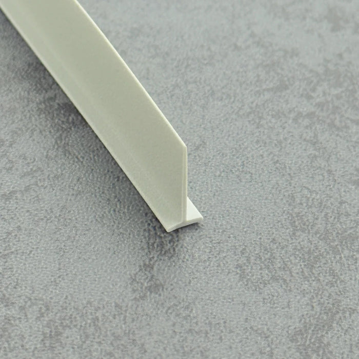 Micro-view of a framed shower door seal strip t shape, showing how the 5mm white T-head achieves an interference fit (tight fit) within wide grooves to prevent loosening or falling out, while the 14mm long soft fin makes moderate contact with the floor, providing lasting bottom sealing performance for heavy framed doors.