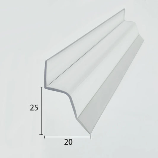 Profile view of the S312DTL7 self-adhesive bottom seal, illustrating the transparent PVC body with an integrated adhesive backing and extended side fins, designed for surface application on glass panels.