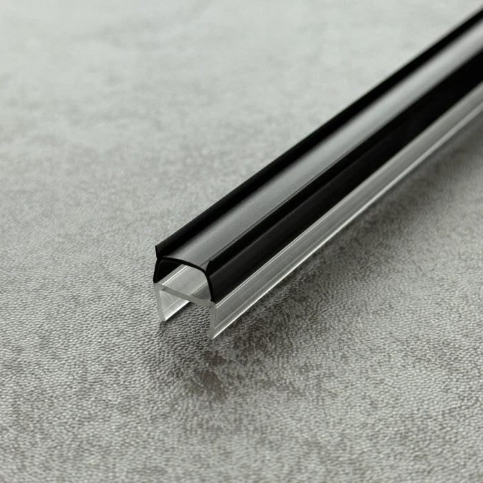 Close-up of the RY3537 vertical shower seal showing the rigid glass channel and flexible black cushion