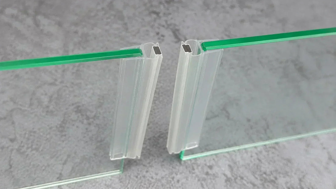 Close-up of two magnetic shower door seals separated by a gap and not sealing properly