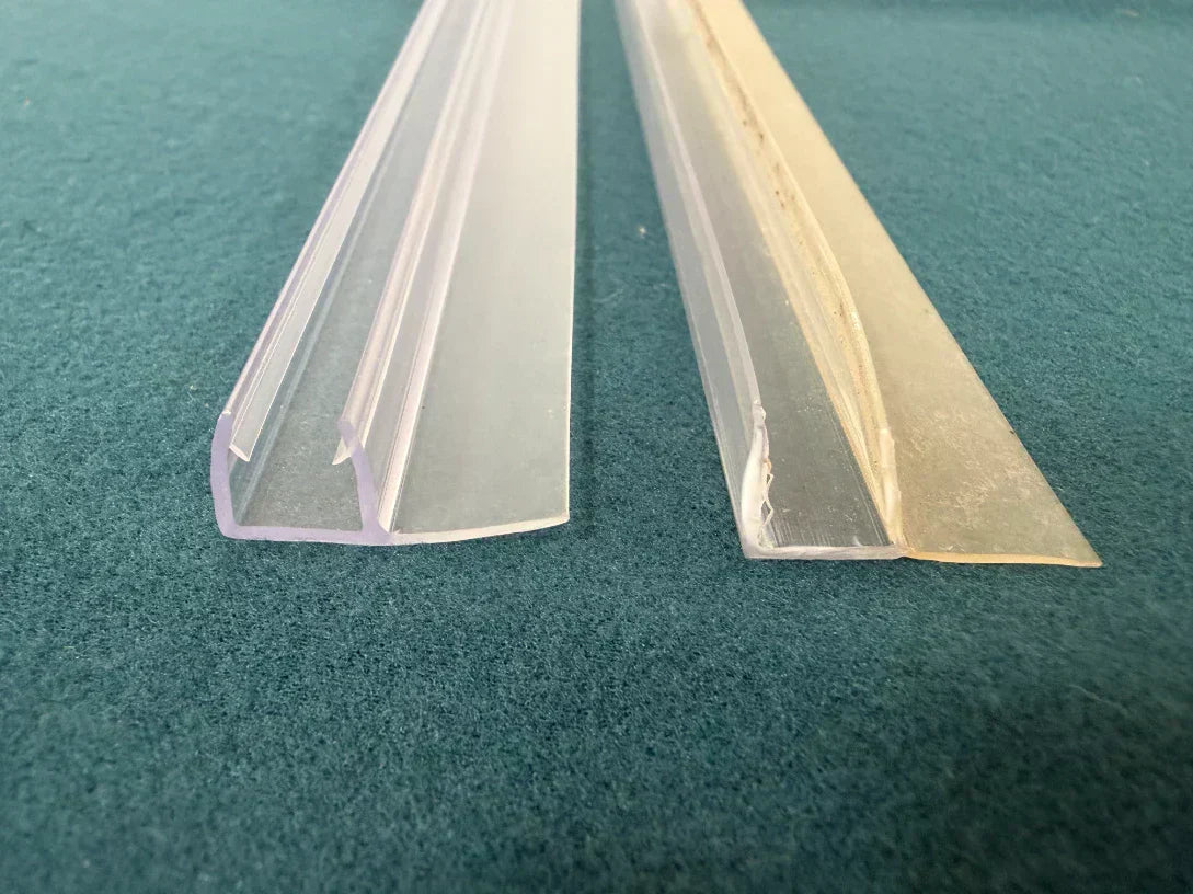 Comparison of U-channel elasticity: Simba's flexible co-extruded seal (right) maintains its shape, while the competitor's rigid PVC (left) shows signs of deformation.