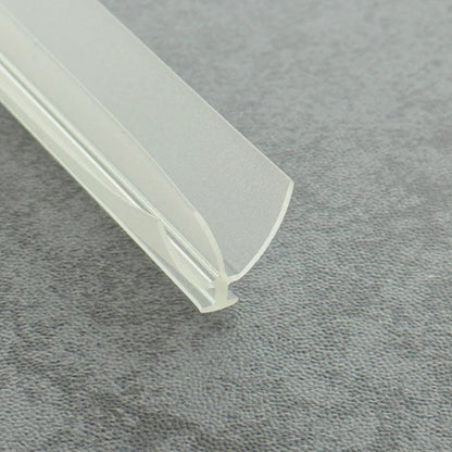 Micro-view of a shower frame gasket seal, showing how the 5mm T-post achieves a secure lock while all three fins (centre, left, and right) work in tandem: the main fin seals the floor, and the side fins capture and channel sideways splashes from any direction, providing -free bottom waterproofing for framed shower doors to significantly reduce the risk of slippery bathroom floors.