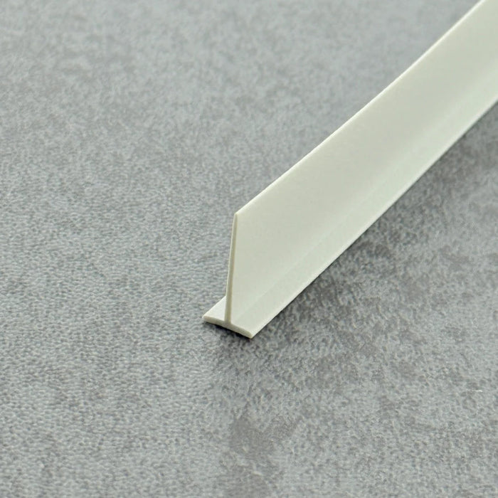 High-clarity close-up of a shower enclosures white vinyl framed shower door drip sweep (adapted from clear vinyl search intent), showcasing the uniform white matte finish, smooth surface, and flexibility of the VH007's 14mm fin, highlighting its resistance to ageing as an effective substitute for yellowed or hardened old seals to restore the tidy appearance of shower screen bases.