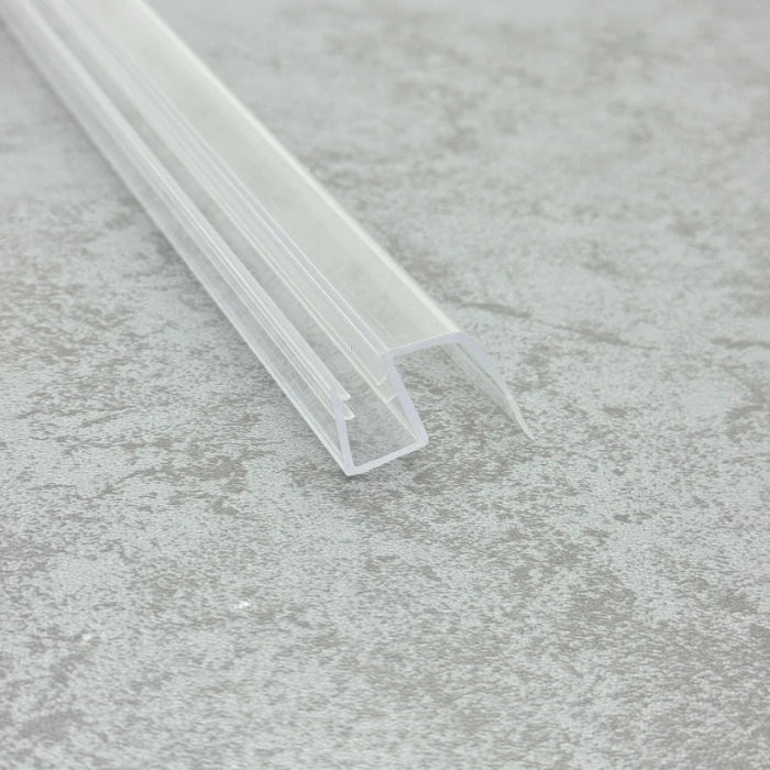 Macro close-up of the S810DTL-N reinforced profile, highlighting the thickened base structure required to support the extended 10mm fin, finished with a consistent high-gloss transparent appearance.
