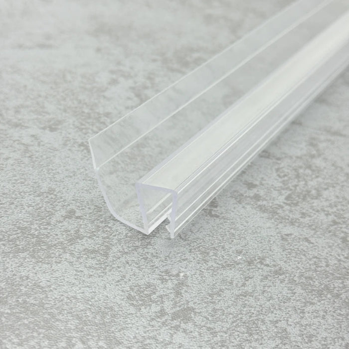 High-resolution detail of the S810DTL-N crystal-clear body, showcasing uniform material density and optical clarity that contributes to a discreet finish suitable for modern frameless enclosures.