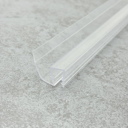 High-resolution detail of the S810DTL-N crystal-clear body, showcasing uniform material density and optical clarity that contributes to a discreet finish suitable for modern frameless enclosures.