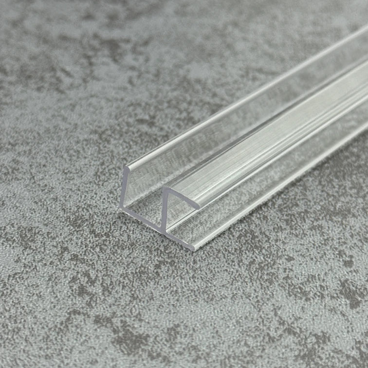 Angled view of the C410A90 clear shower screen corner seal for fixed glass panels