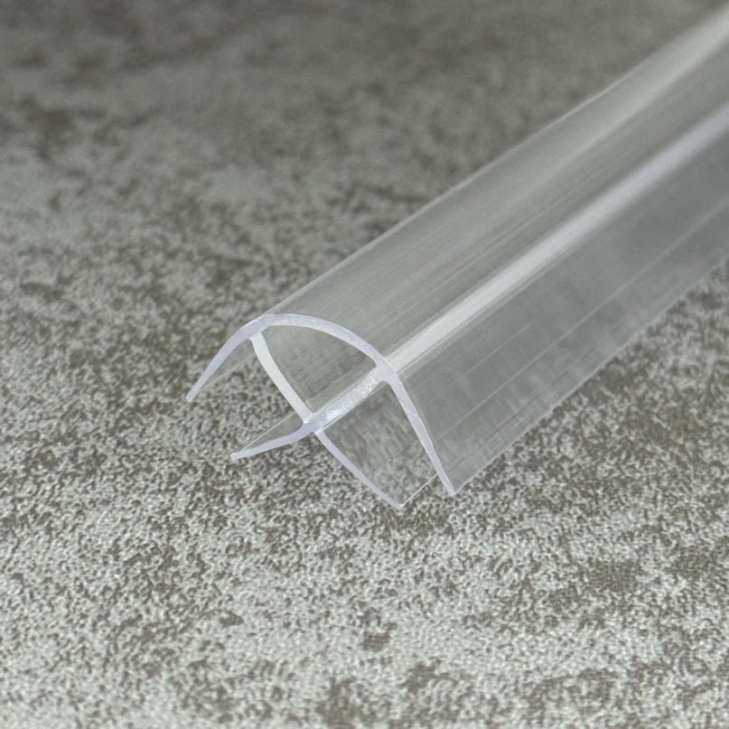 Close-up of CO810 90 degree corner seal for two fixed 8-10mm shower glass panels