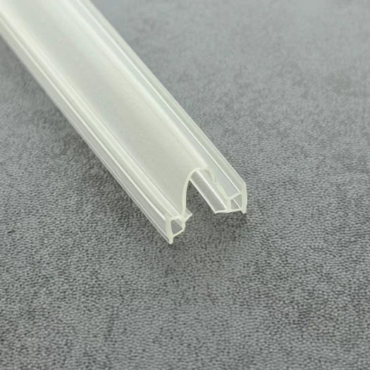 Close-up of the DOU01 shower door seal with T-shaped edges for aluminium frame channels