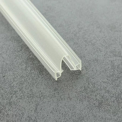 Close-up of the DOU01 shower door seal with T-shaped edges for aluminium frame channels