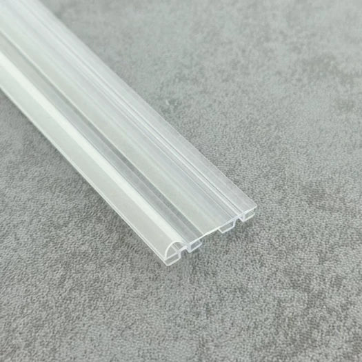 DOU02 clear framed folding shower door centre seal profile close-up