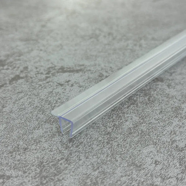 Close-up of the clear PVC F456S8 F shape shower door seal with short flexible fin