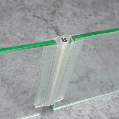 M10B2M magnetic seal pair fitted where two 10mm sliding shower door glass panels meet in a straight 180-degree closure