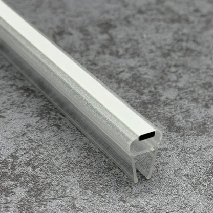 Close-up of the magnetic strip inside the M45B2M sliding shower door seal profile