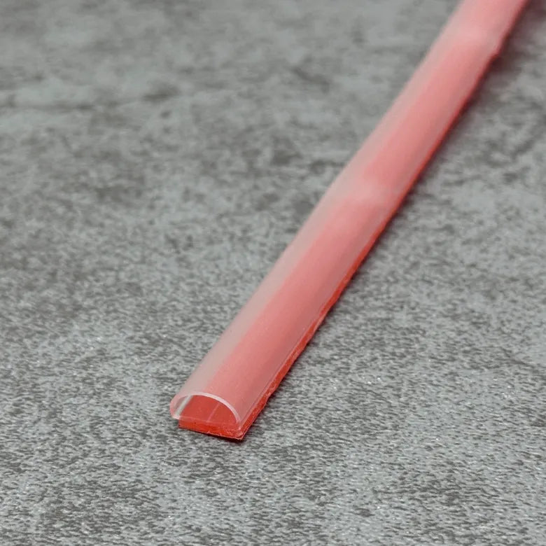 Close-up of the soft PVC PV29 self-adhesive shower threshold water barrier profile