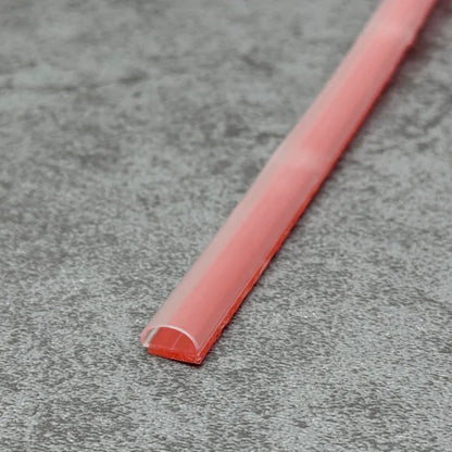 Close-up of the soft PVC PV29 self-adhesive shower threshold water barrier profile