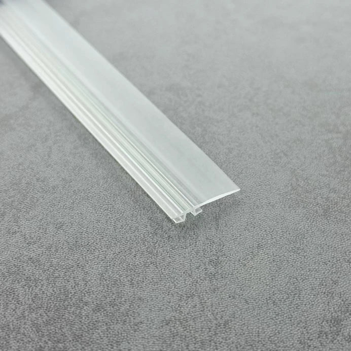 Close-up of the clear PVC ROT05 folding shower door track insert seal with long flexible fin