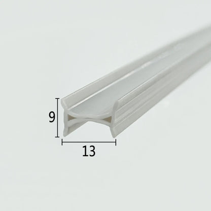 ROT07 framed folding shower door bumper seal in light grey PVC with 13mm by 9mm profile
