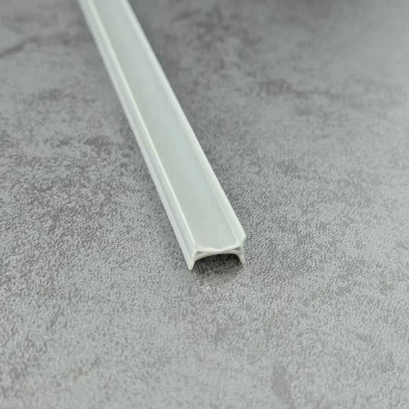 Close-up of the light grey ROT07 folding shower door cushioning seal for side frame channels