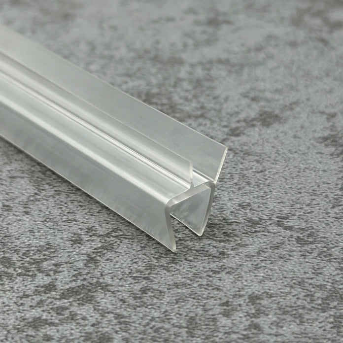 Close-up of the clear PVC RY0483 low-clearance shower door bottom seal for small gaps