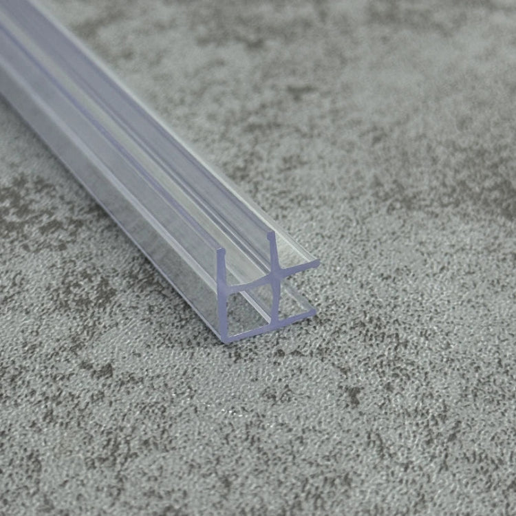 Close-up of the RY0603 rigid shower screen corner seal profile with enclosed support chamber
