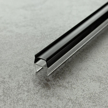 Close-up of the RY3537 vertical shower seal showing the rigid glass channel and flexible black cushion