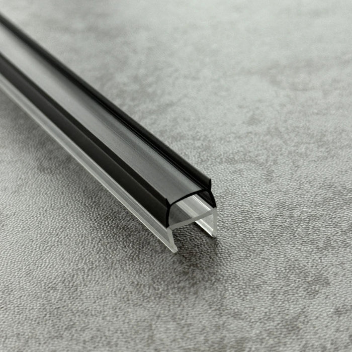 Close-up of the RY3537 vertical shower seal showing the rigid glass channel and flexible black cushion