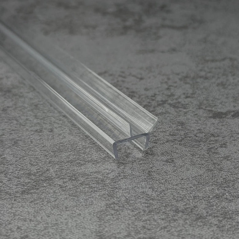 RY6672 clear shower door bottom seal showing angled side water-guiding fin