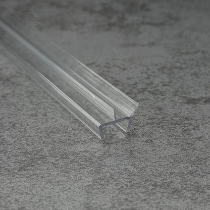 RY6672 clear shower door bottom seal showing angled side water-guiding fin