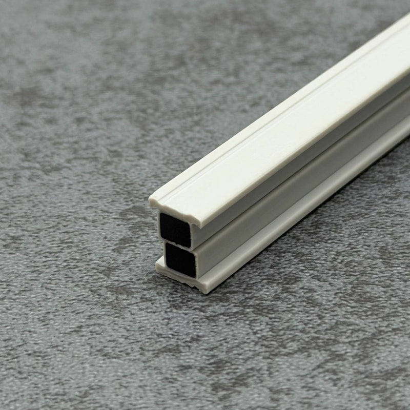 Close-up of the white flexible TPE profile and enclosed magnetic insert of the RY7474 sauna door seal