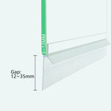 SIMBA S312S1235 universal adhesive TPE sauna door seal installed onto a frameless glass door bottom, showing optical clarity and secure bond.
