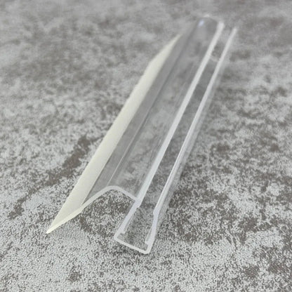 Angled view of the SL810DTL flexible side fin profile for straight shower glass