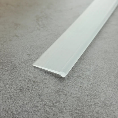 Close-up of the clear flexible PVC VF003 round bead bottom seal profile