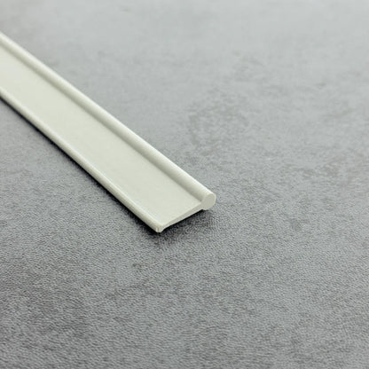 Close-up of the soft white PVC VF005 round bead bottom seal profile