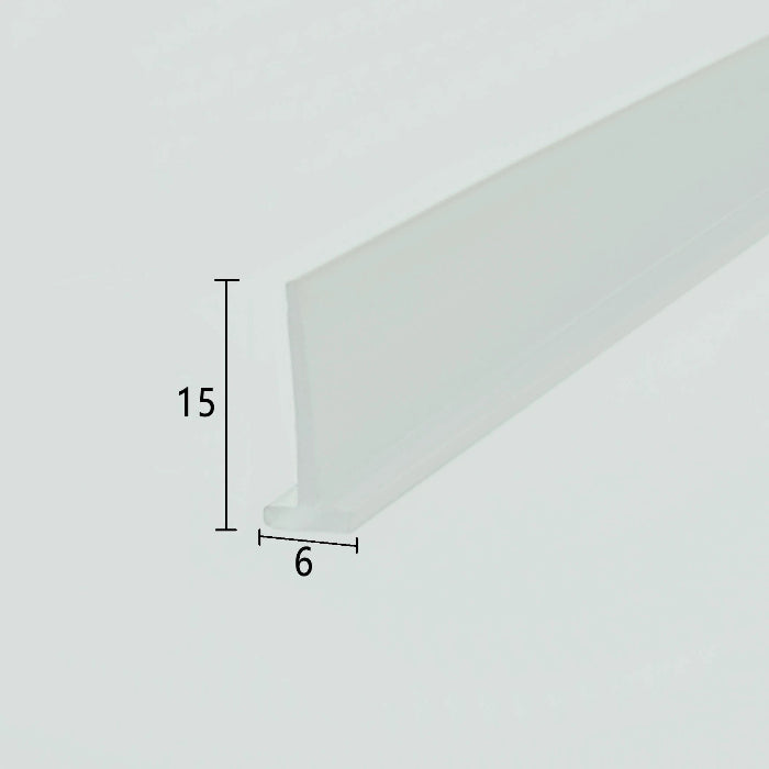 Cross-section close-up of the VH002 framed shower door bottom sweep, showcasing the transparent soft PVC with a unique 6mm extra-wide T-shaped top and a 15mm long sweeping fin, optimized to lock securely into non-standard wider base tracks of framed doors for reliable water channelling and leak protection.