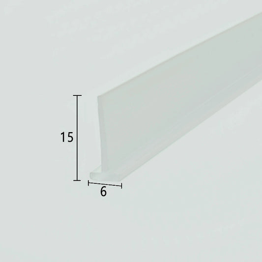 Cross-section close-up of the VH002 framed shower door bottom sweep, showcasing the transparent soft PVC with a unique 6mm extra-wide T-shaped top and a 15mm long sweeping fin, optimized to lock securely into non-standard wider base tracks of framed doors for reliable water channelling and leak protection.