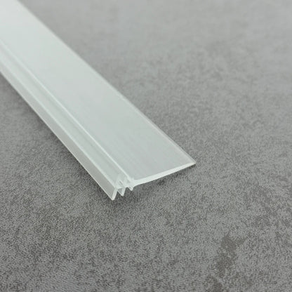 Angled view of the VI003 flexible bi-fold framed shower door seal with a long 32mm profile