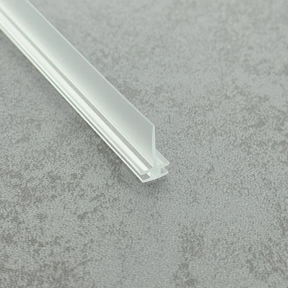 Angled view of the VI005 flexible bi-fold framed shower door seal with a compact 15mm fin
