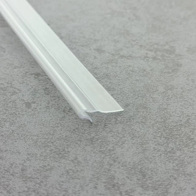 Close-up of the clear PVC VL001 framed shower door insert seal with curved hook fixing