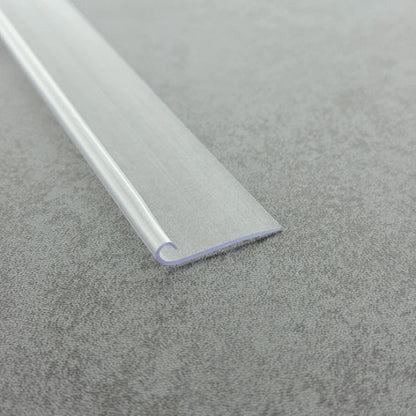 Close-up of the clear PVC VL002 framed shower door insert seal with hooked fixing profile